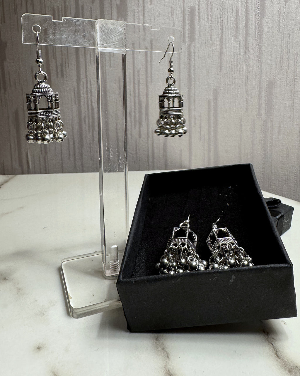 Jharokha oxidised silver jhumka showing the domed jharokha with open arches and ghungroo bell fringe